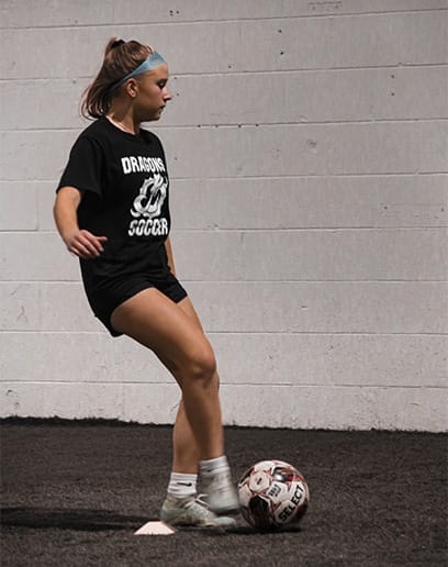 teen taking a private training soccer class